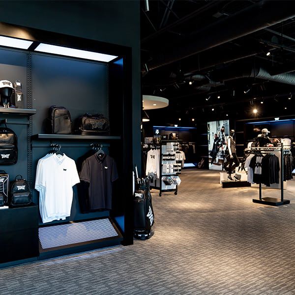 PXG Dallas apparel shopping displays.