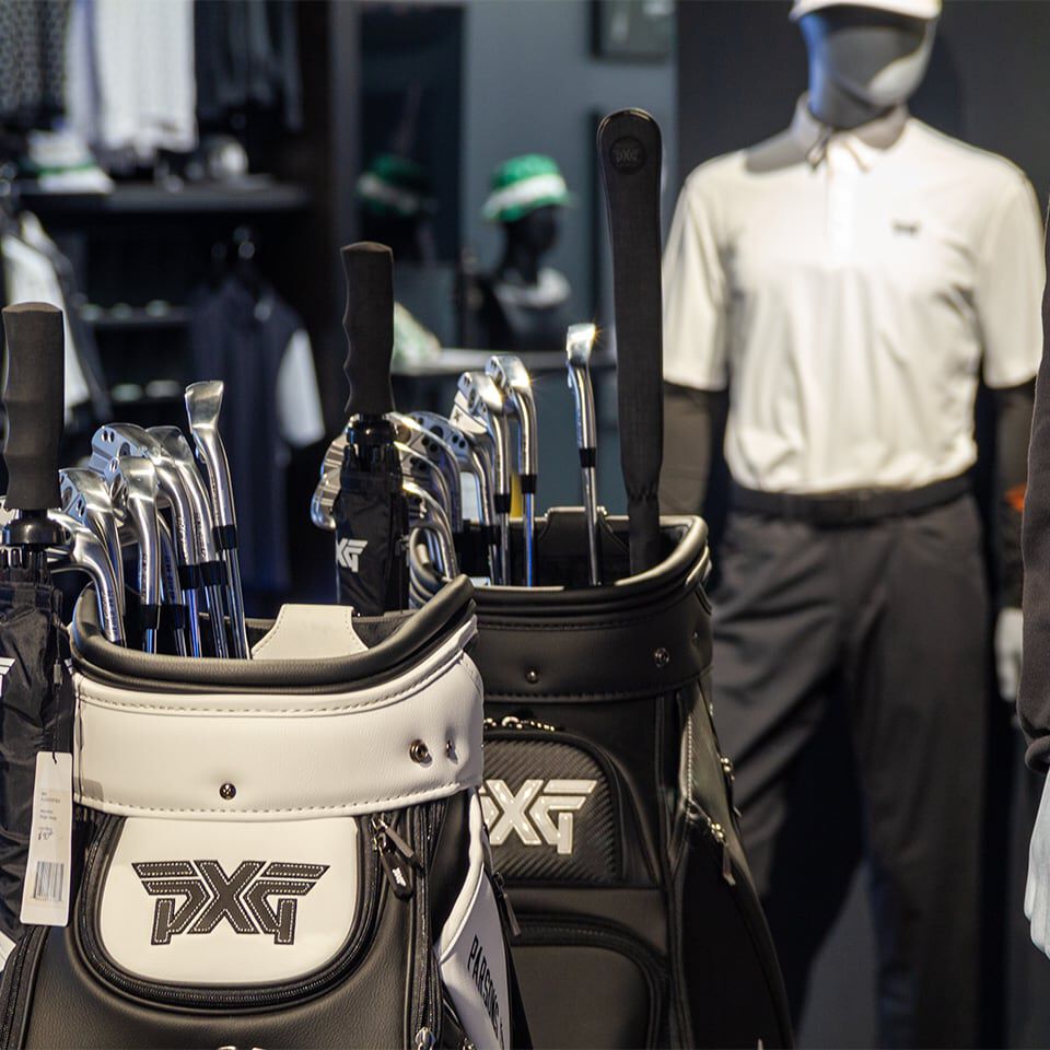 PXG Minneapolis Interior photo with mannequins and golf apparel