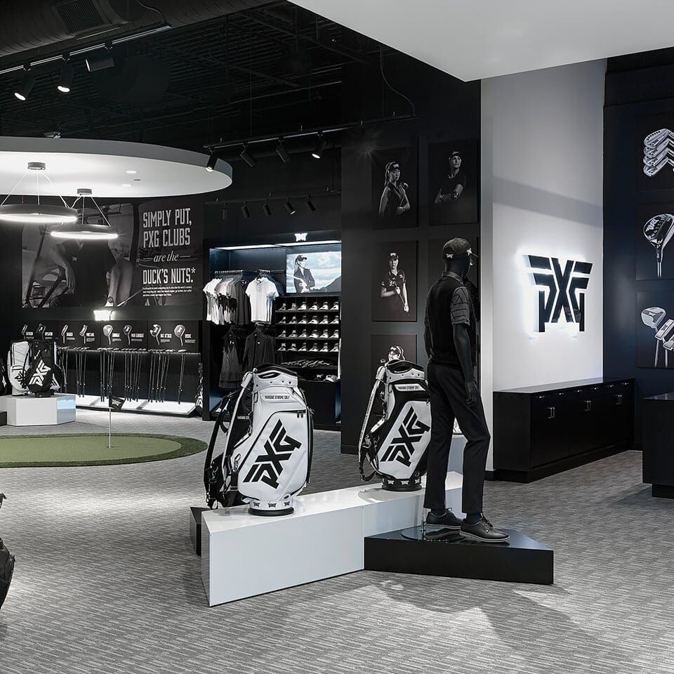PXG Chicago Interior showing golf bags and putters.