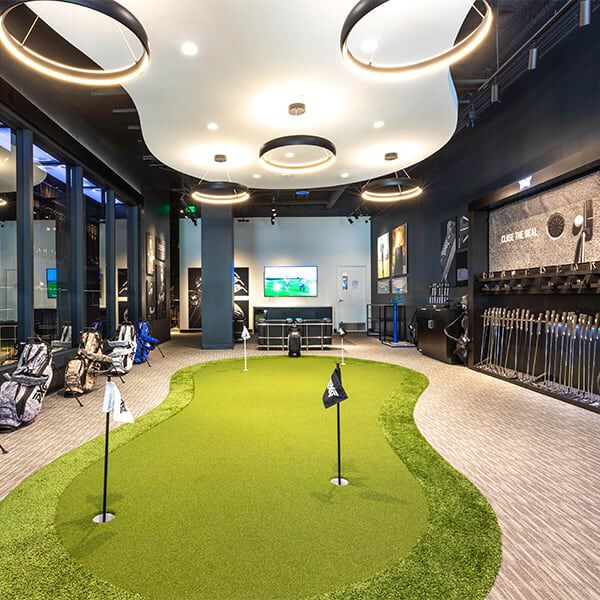 PXG Westgate Interior photo showing various shirts and other apparel items for sale.